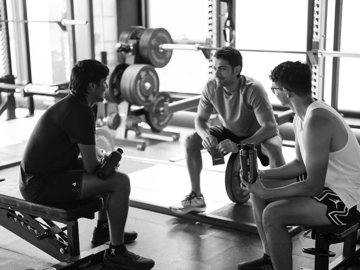 Gym-goers with protein shakers after a workout